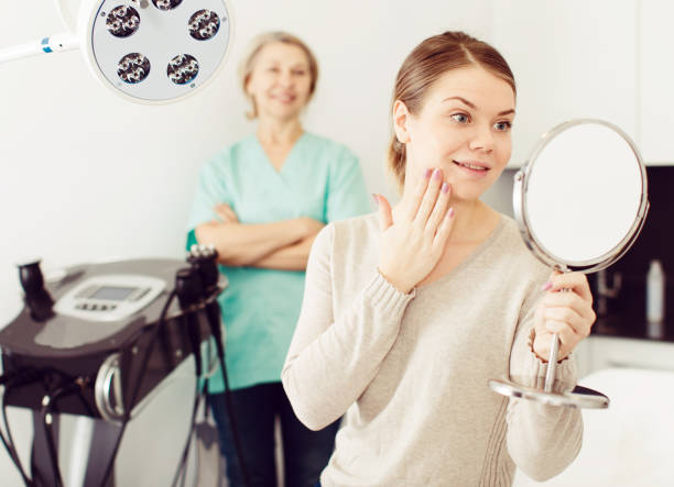 istock Smiling woman after cosmetological procedure 958732630