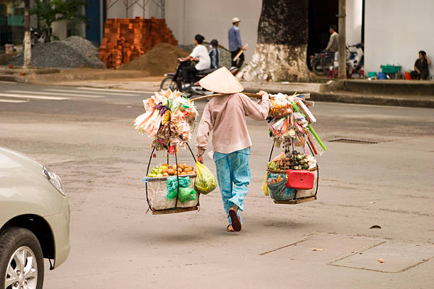Vietnamese Bicycle Worker with Hat Hanoi, Vietnam 2022