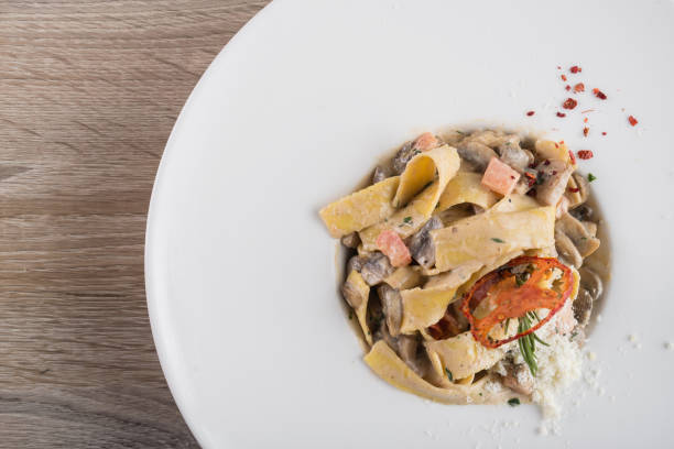 istock delicious pasta with vegetables and parmesan 958742628