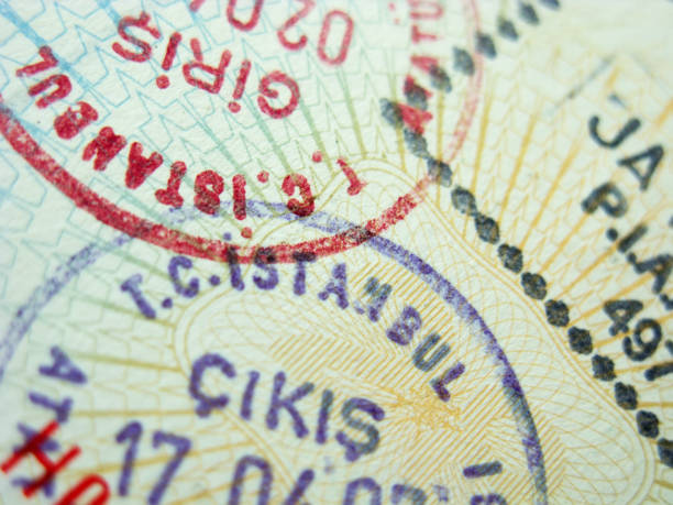 istock A close-up of three passport stamps for different countries 95874676