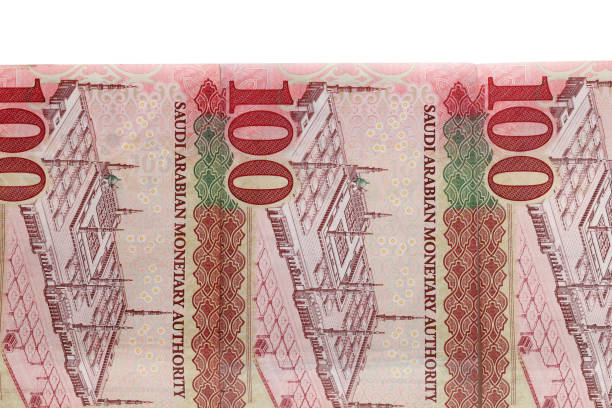 istock Saudi Arabia Hundred Riyal banknotes isolated on white background 958748860