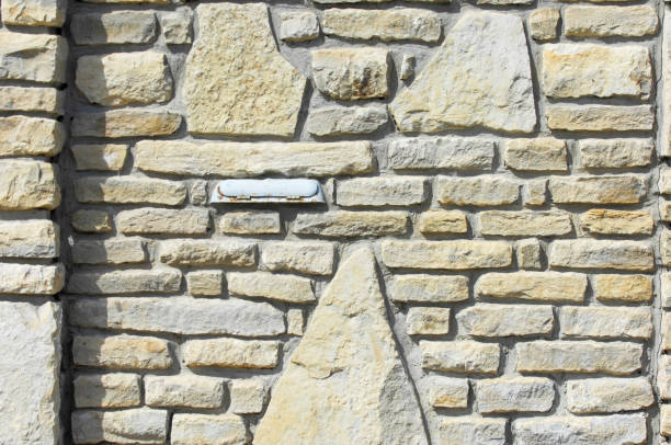istock Texture background, pattern. The wall is stone. Architecture. Construction, house fencing. Sandstone cobbles 958754592