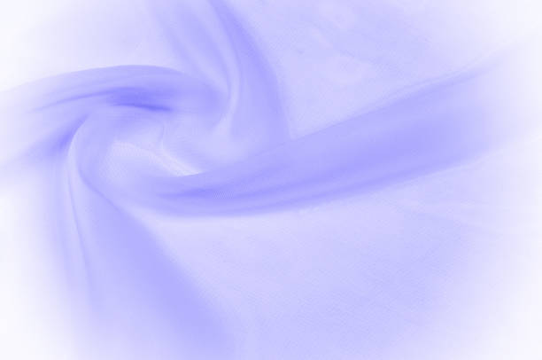 istock blue silk transparent fabric. this silk is incredibly smooth and transparent. With flowers that disappear from one to another, and his drapery, flowing with each movement creates truly elegant figures 958757558