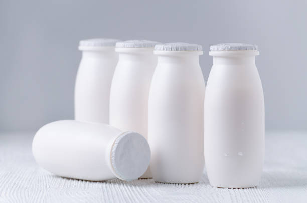 istock drink yogurt in plastic bottles on gray background 958766912