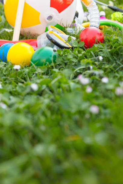 istock spring or summer with various outdoor fun equipment, green meadow 958769570