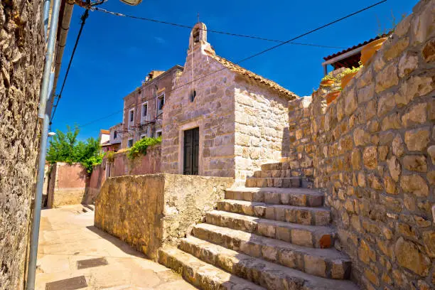Old stone narrow street and chapel in Cavtat, town in south Dalmatia, Croatia