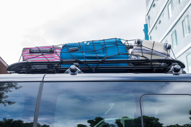 Rack on roof van with luggage colors stacked
