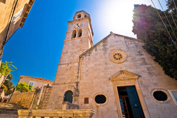Town of Cavtat stone church view, south Dalmatia region of Croatia Town of Cavtat stone church view, south Dalmatia region of Croatia cavtat photos stock pictures, royalty-free photos & images