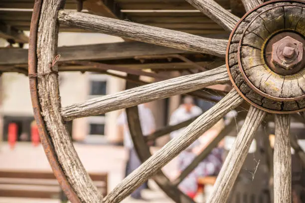 Historical Chuck Wagon Wheel on display with Cobwebs