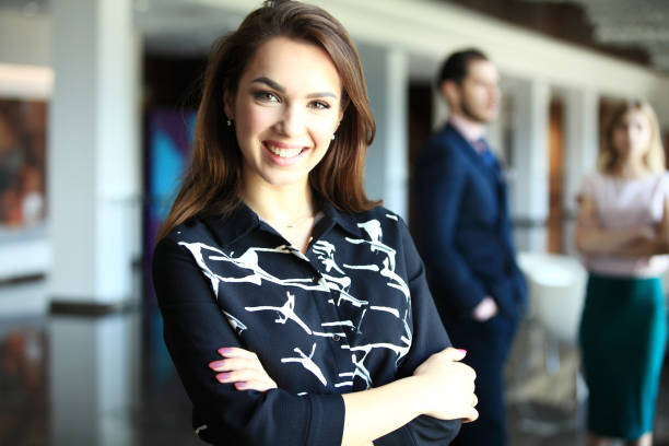 istock Modern business woman in the office with copy space. 958788500