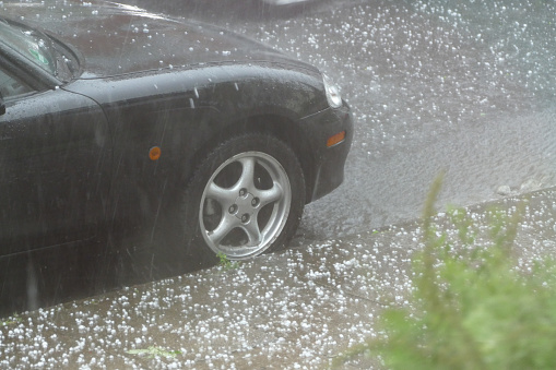 Hamburg, Germany - May 11. 2018: After a short heatwave, storm with heavy hail and extreme rain in the south-east of Hamburg, Germany
