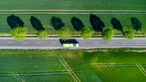 дорога через поля - german countryside стоковые фото и изображения