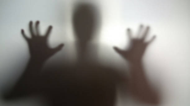 istock Mysterious silhouette with hands up, going to scare, nightmare person in stress 958794614