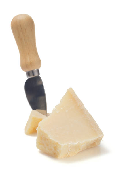 istock pieces of parmesan cheese on white background 958795744