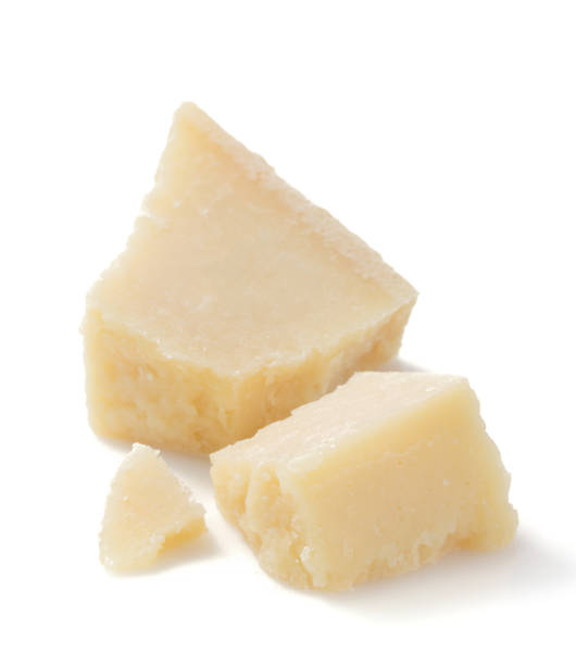 istock pieces of parmesan cheese on white background 958795756