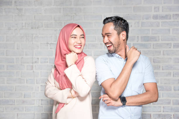 Portrait of a young asian couple, made in studio.