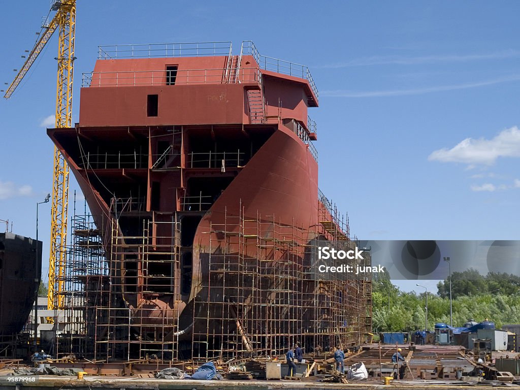 Construction of a new red building on a nice, sunny day Hull during construction works Color Image Stock Photo