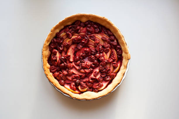 istock Freshly baked pie with apples and cherries from above 958799960