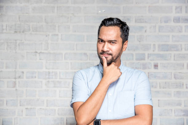 istock Portrait of a young handsome man 958807128