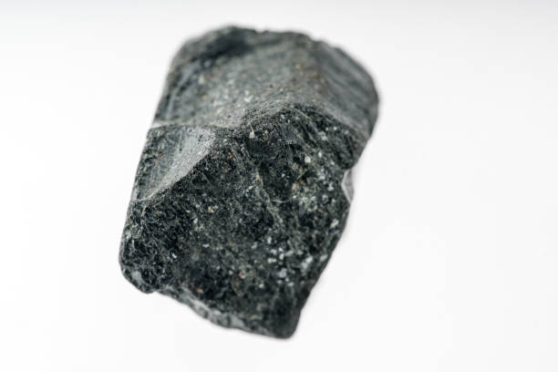 istock Black tourmaline with white background studio shot 958807332