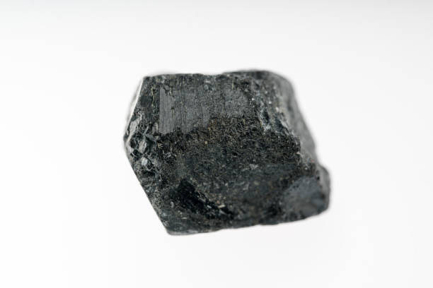 istock Black tourmaline with white background studio shot 958808740