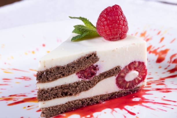 istock Very tasty cake with raspberry jam. bitten and beautiful dessert with raspberry berries. Tasty and beautiful dessert with berry raspberry 958813370