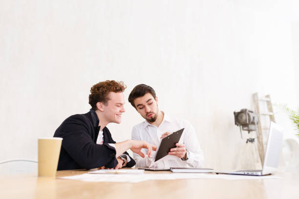 istock Team of young professionals works together 958826038