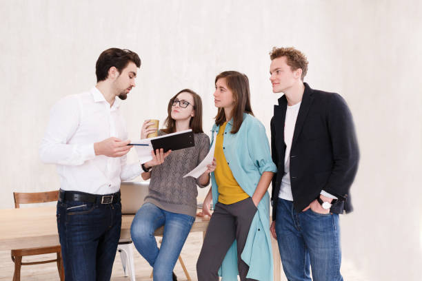 istock Team of young professionals works together 958830288
