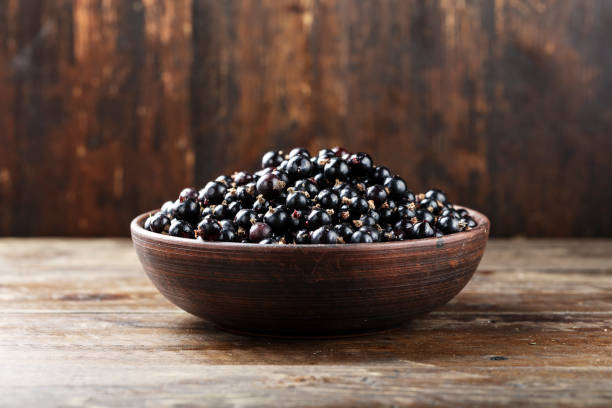 istock natural antioxidant fresh organic currant on a wooden background 958830974