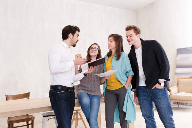 istock Team of young professionals works together 958831012