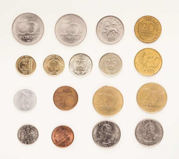 Set of coins of different countries on white