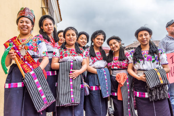 Maya beauty pageant princesses, Antigua, Guatemala Antigua, Guatemala - December 7, 2017: Maya beauty pageant princesses from Quiche dressed in traditional costume in the street of UNESCO World Heritage Site puerto quetzal guatemala stock pictures, royalty-free photos & images