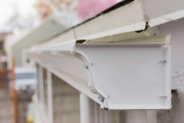 White gutter endcap Recently installed gutter endcap roof gutter photos stock pictures, royalty-free photos & images