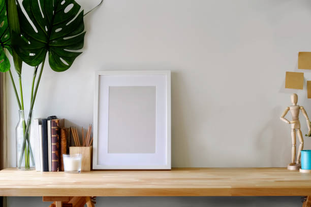 Mockup poster on wooden table with copy space. Mockup poster on wooden table with copy space. table photos stock pictures, royalty-free photos & images