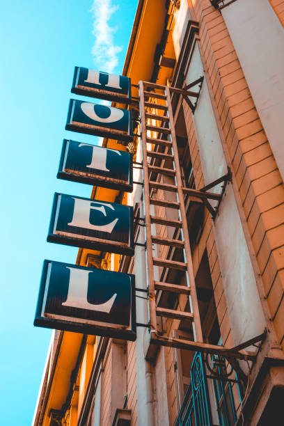 istock typical blue hotel letters on orange building 958836106