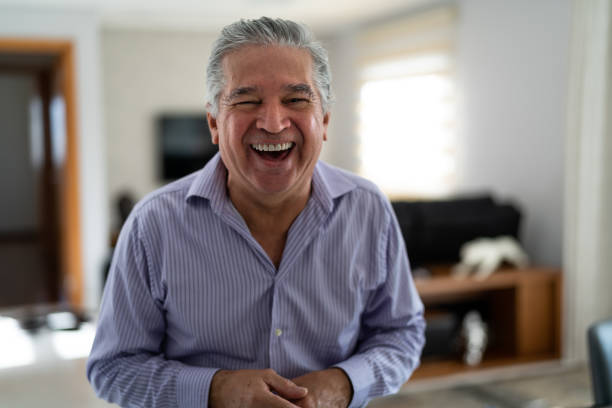 istock Mature Man Dancing and Welcoming Home Opening His Front Door 958836390