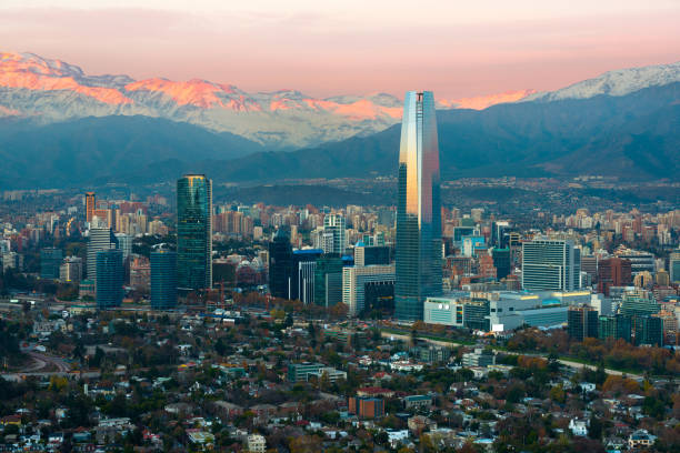 Panoramic view of Providencia and Las Condes districts with The Andes Mountain Range at sunset in Santiago Panoramic view of Providencia and Las Condes districts with The Andes Mountain Range at sunset, Santiago de Chile santiago chile photos stock pictures, royalty-free photos & images
