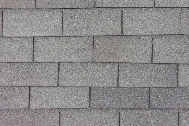 istock Overhead of roof shingles 958839204