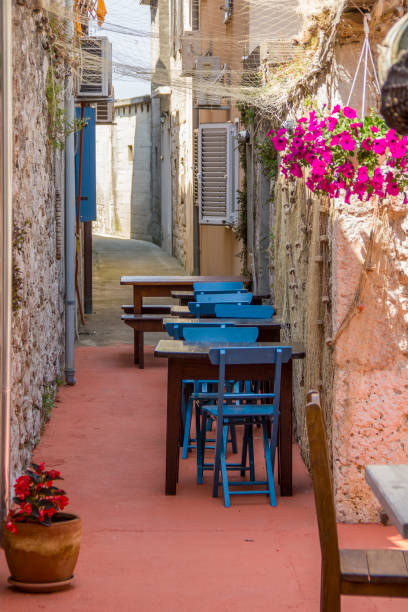 istock blue chairs in the street 958847768