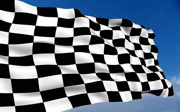 istock Finish line checkerboard flag waving in a blue sky 95885015