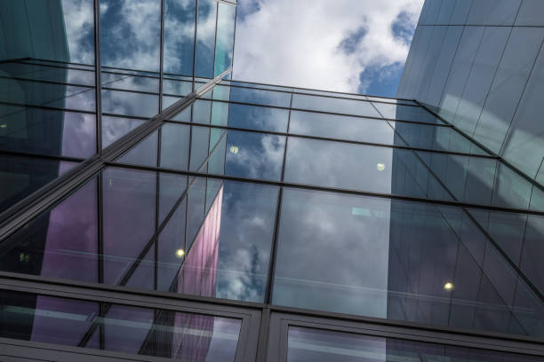istock The glass architecture in city against a sky 958852472