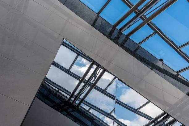 istock The glass architecture in city against a sky 958852930