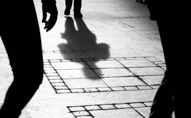 istock Silhouette shadow of three  people 958853030