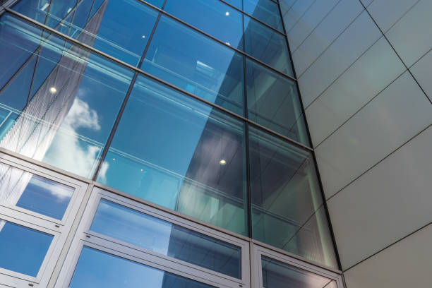 istock The glass architecture in city against a sky 958853400