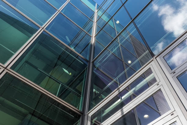 istock The glass architecture in city against a sky 958853646