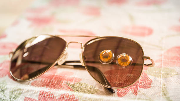 Contact lenses with sunglasses on the table
