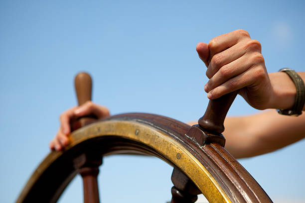 Hand on ship rudder. Hand on ship rudder. rudder stock pictures, royalty-free photos & images