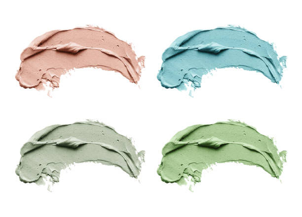 istock Blue clay facial mask smear on white isolated background 958859088