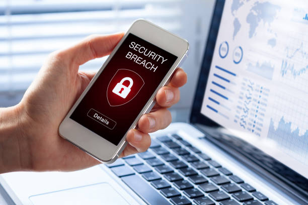 Security breach, smartphone screen, infected by internet virus, cyberattack hacking Security breach warning on smartphone screen, device infected by internet virus or malware after cyberattack by hacker, fraud alert with red padlock icon data breach photos stock pictures, royalty-free photos & images