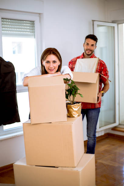 istock Couple Moving Into New Home 958869548